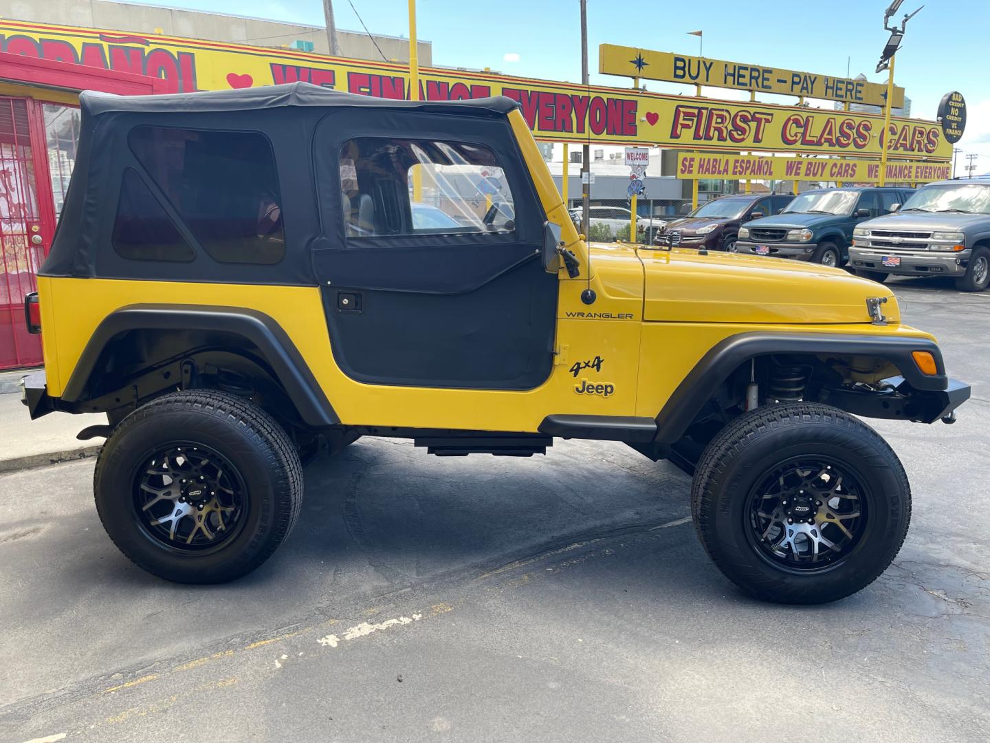 2000 Solar Yellow /Black Jeep Wrangler SE (1J4FA29P9YP) with an 2.5L 4 Cyl. engine, Manual transmission, located at 801 South State Street, Salt Lake City, UT, 84111, (801) 328-0098, 40.751953, -111.888206 - Wow extremely rare to find extra clean Jeep in immaculate condition 4x4! Low miles only 98,248 miles! Interior and exterior are both in excellent shape for the year. This is a clean title no reported accidents on the CarFax history report. It has passed emissions already and is ready to go. Featur - Photo#12